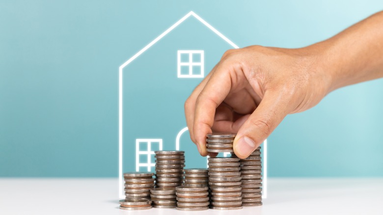 stacking coins in front of a house diagram
