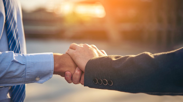 shaking hands sincerely