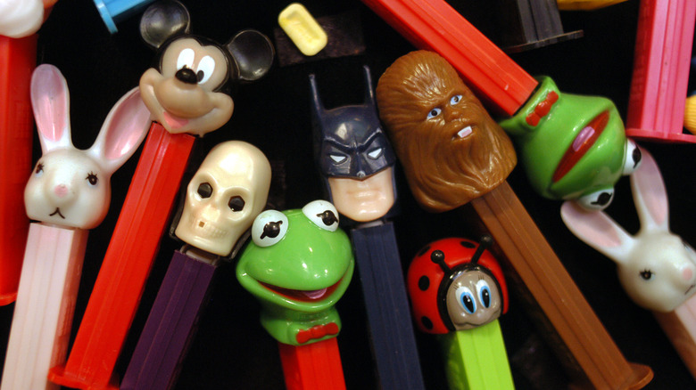 an assortment of PEZ dispensers