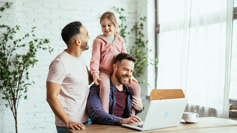 couple with adopted child