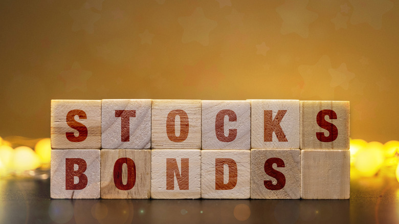 stocks and bonds spelled in blocks
