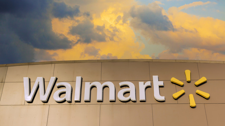 Upward shot of darkened sky over a local Walmart store