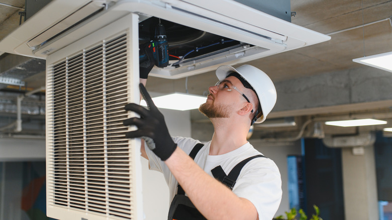 an HVAC repair technician