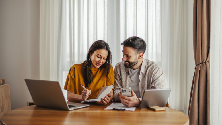 couple looking at their budget