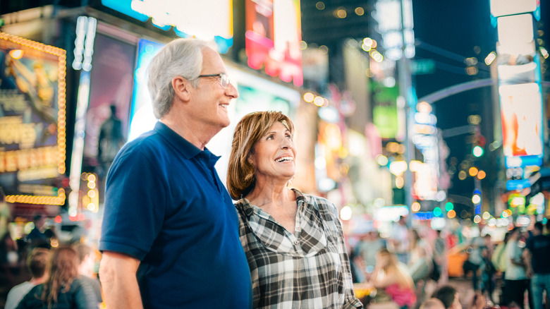 Smiling seniors in Times Square