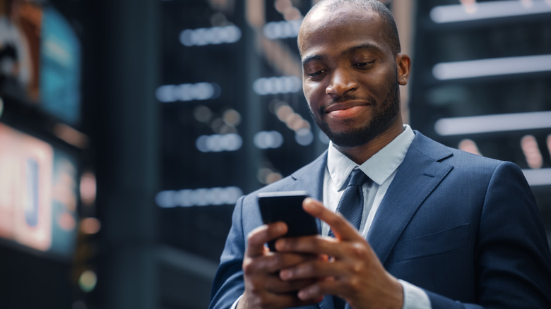 investor looking at his phone