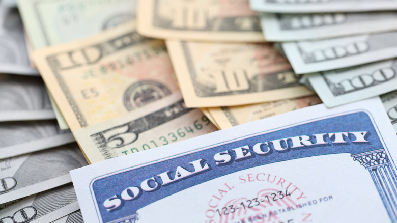Social Security cards and various denominations of cash