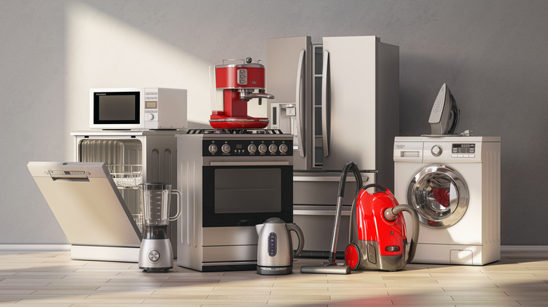 A collection of various home appliances used for cooking and cleaning