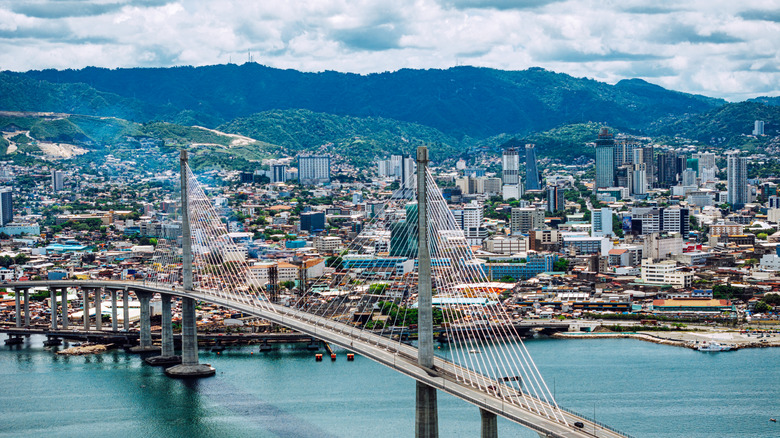 Aerial daytime shot of Cebu skyline with bridge in foreground