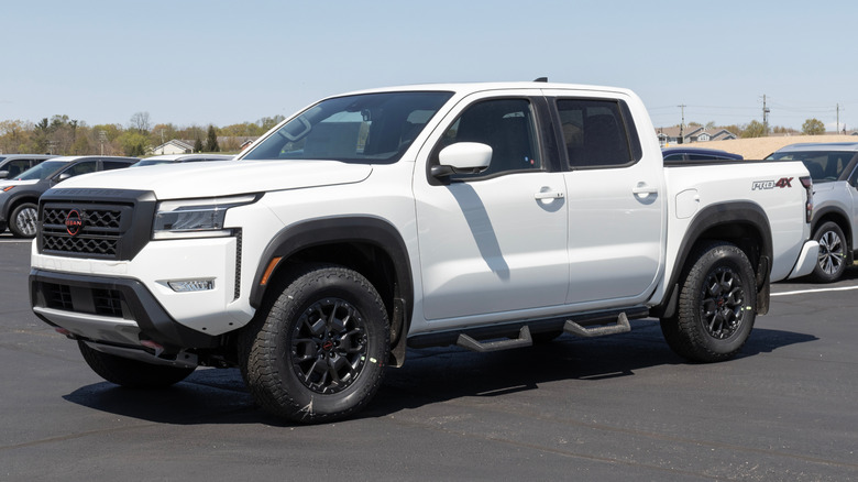 Nissan Frontier pickup truck display at a dealership.