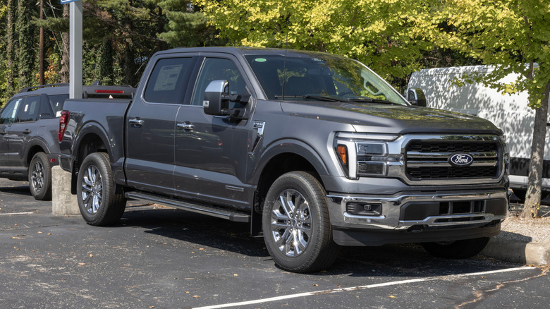 A gray Ford F-150 Hybrid at dealership
