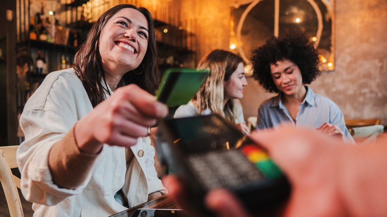woman using credit card