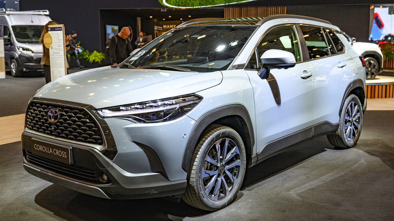 A Toyota Corolla Cross compact crossover SUV on display at the AutoSalon.