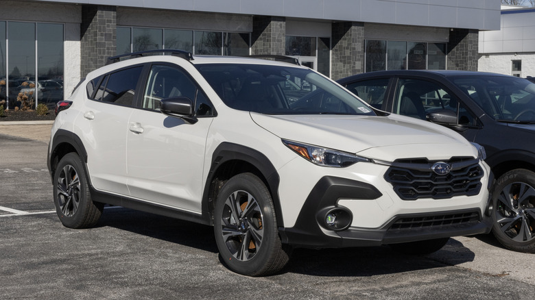 A Subaru Crosstrek Premium SUV on display at a dealership.