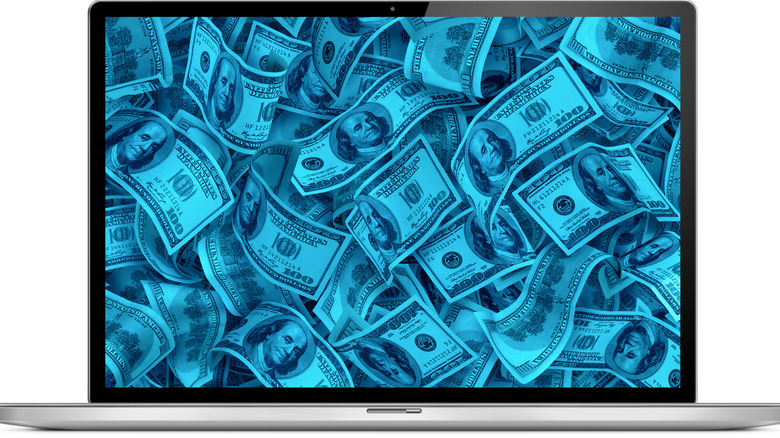 computer screen covered with monoey