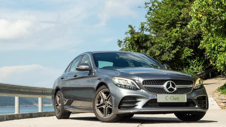 Mercedes-Benz C-Class parked beside a lake