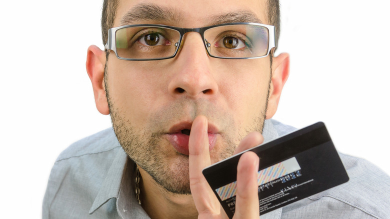 man with a secret credit card