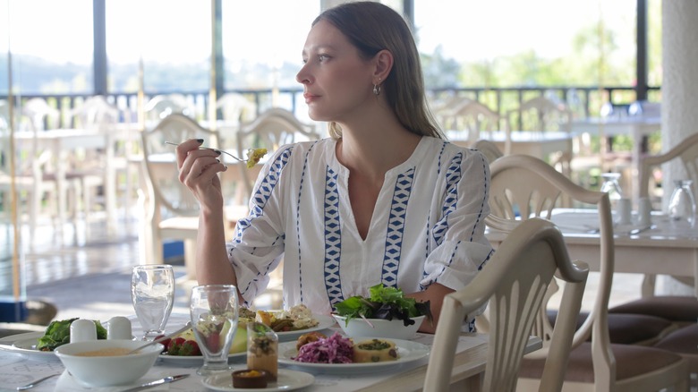 A woman dining alone