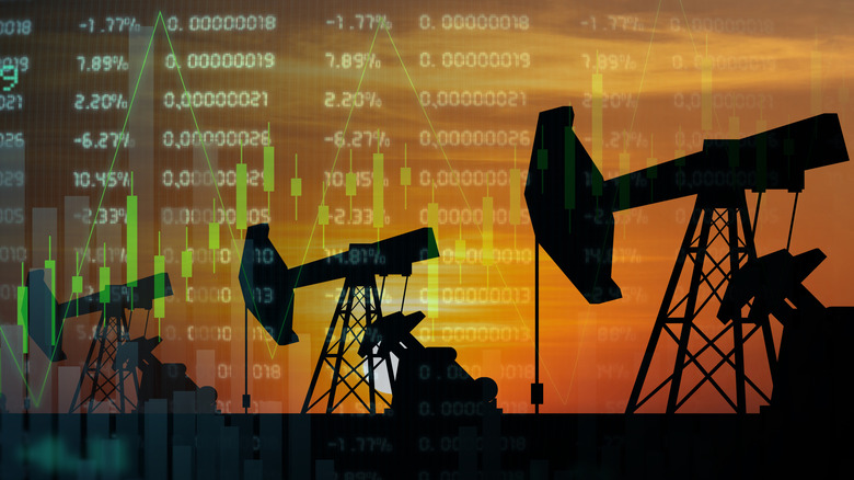 Oil pumps and overlayed with a digital graph and numbers.