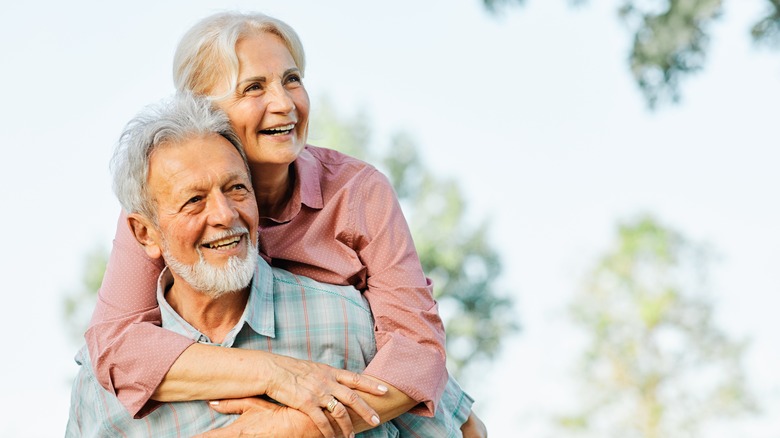 retired couple smiling
