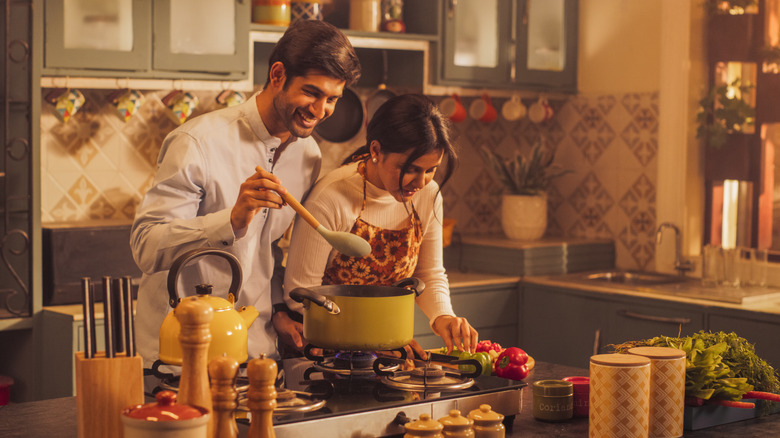 couple cooking together