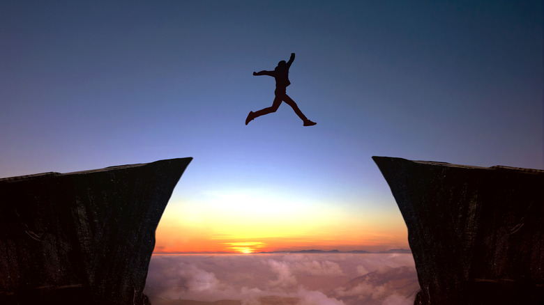 leaping from one cliff to another