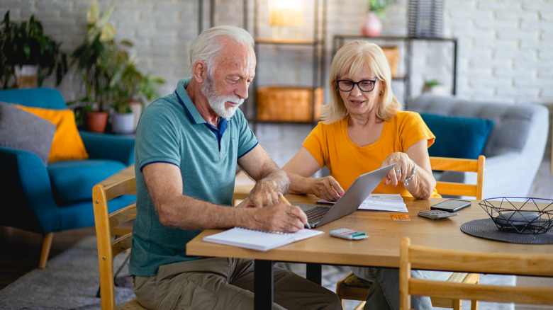 retired couple looking over finances