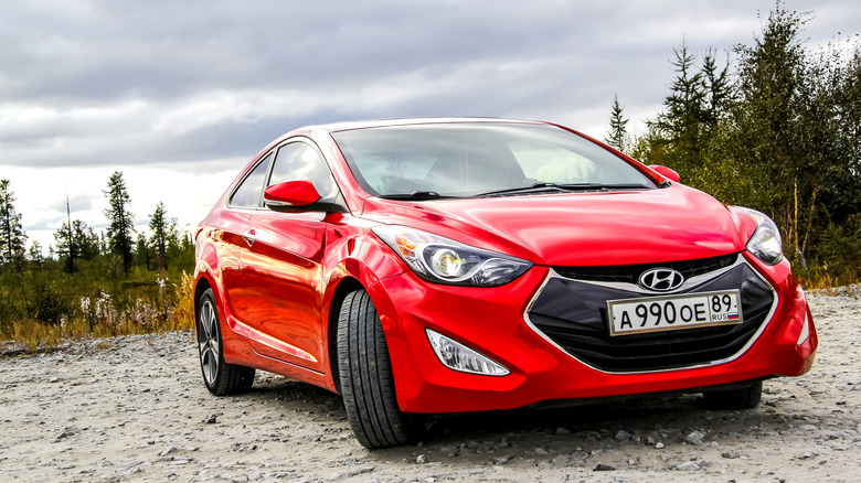 Motor car Hyundai Elantra at the countryside