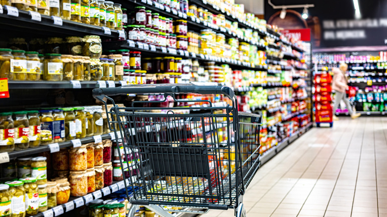 An empty shopping cart in a grocery store
