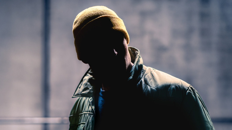 Shadowy man in the dark