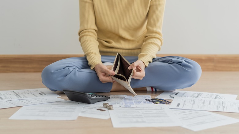 person with empty wallet