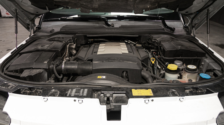 The open hood of a Range Rover