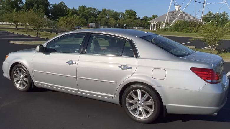 A side view of a gray 2010 Toyota Avalon