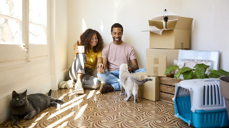 family unpacking in their new home