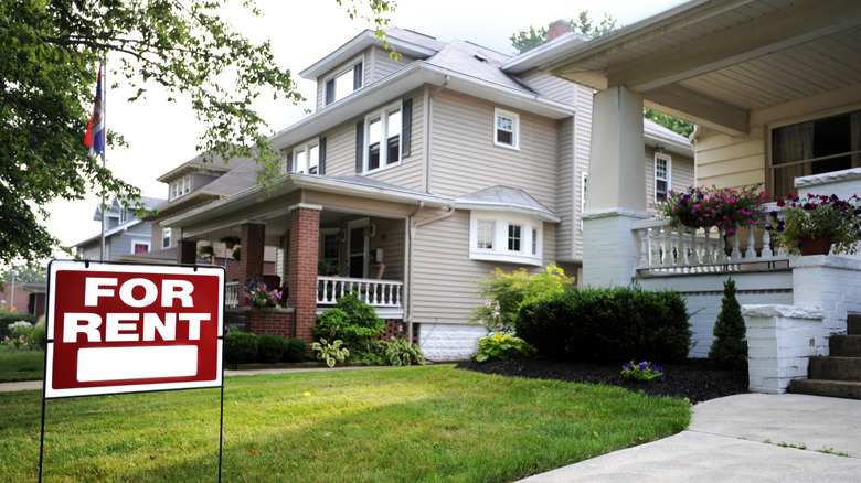 Rental sign in front of a house