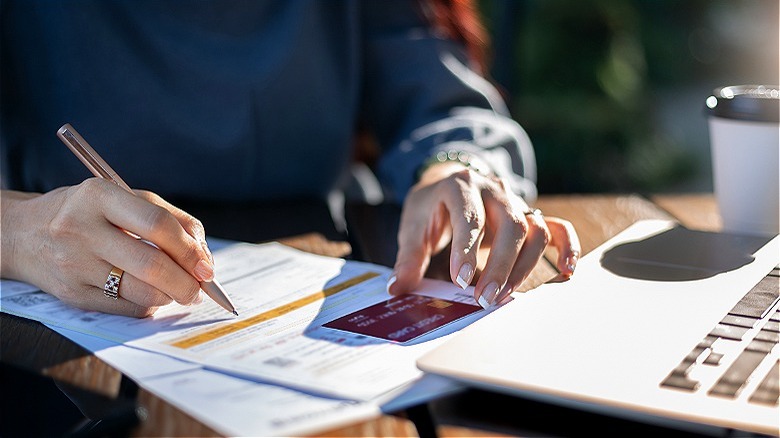 Person checking credit card statement