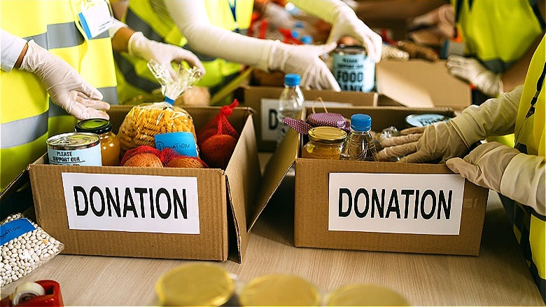 workers preparing food donations