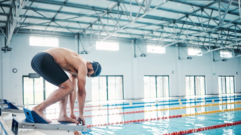 A man diving into a pool