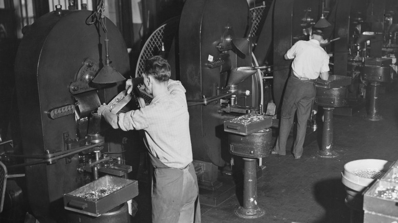 Two men making coins at Philadelphia Mint
