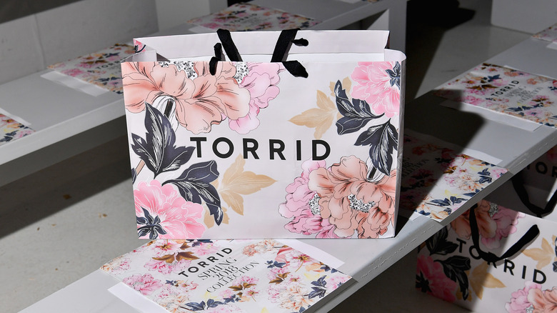 A view of a Torrid bag backstage at Torrid