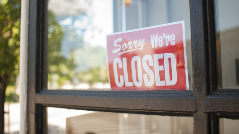 "Sorry we're closed" sign