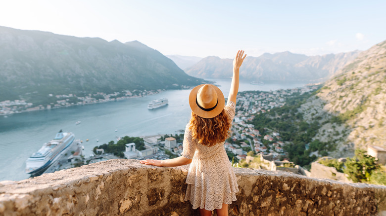 Tourist overlooking scenic vista