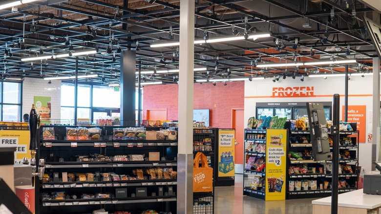 The inside of an Amazon Go store with all the cameras and sensors visible on the ceiling.