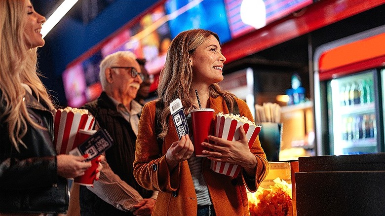 People at movie concession stand
