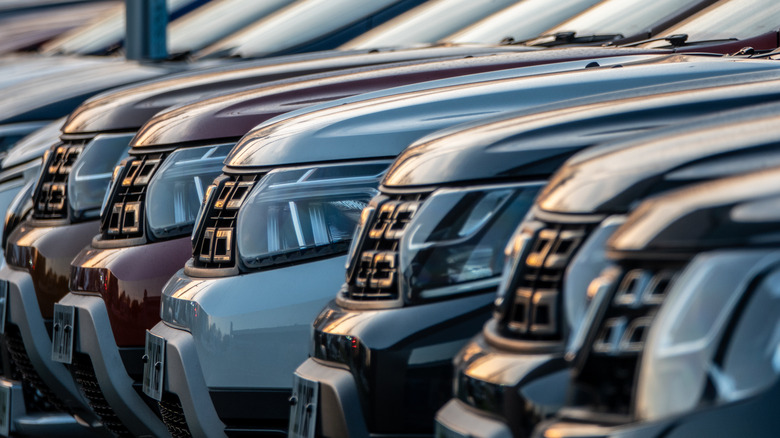 Cars lined up at a dealership