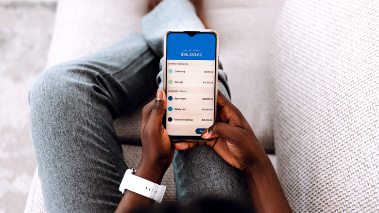 Woman managing her online bank account