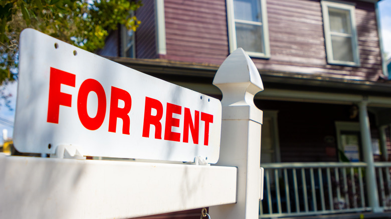 For Rent sign in front of house