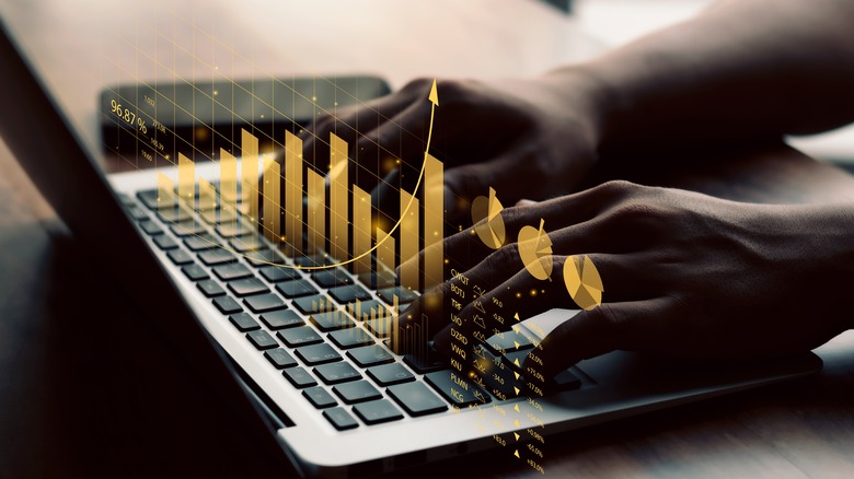 investment image overlaid on laptop