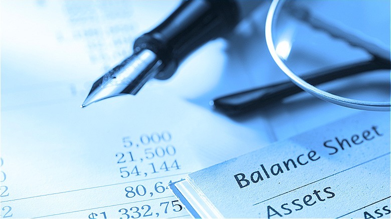Fountain pen and financial documents