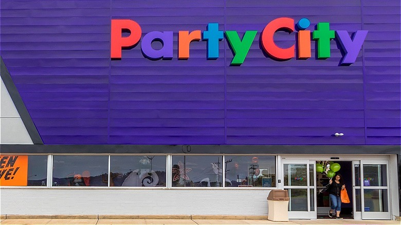 Person exiting Party City store